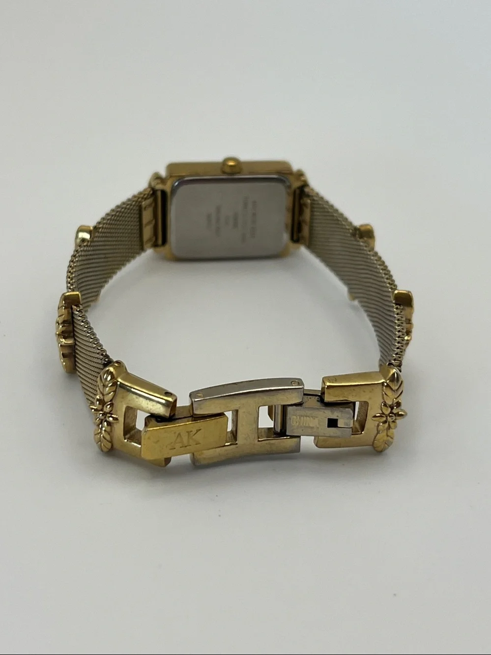 Anne Klein Women's Gold Mesh Bracelet Watch with Leaf Accents